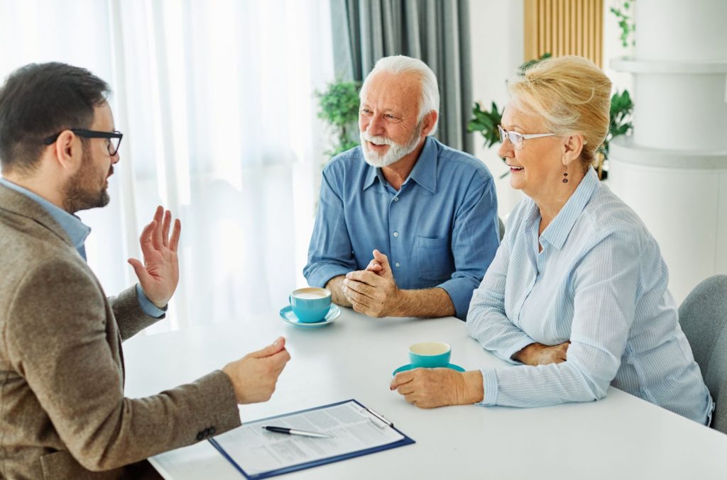 Older couple meeting with an independent adviser to discuss Power of Attorney and future planning